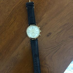 Black and gold Michael Kors watch